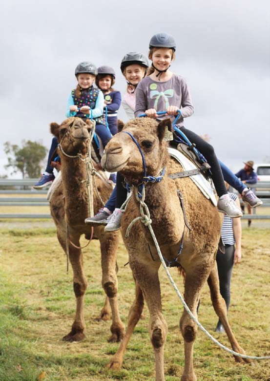 children-riding-camel
